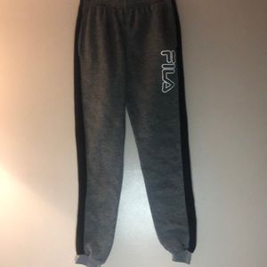 Gray, White and Black Fila pants